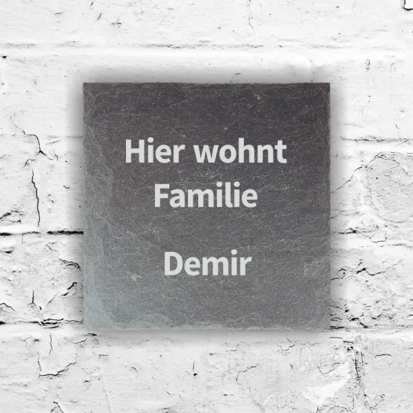 Tuerschild aus Schiefer mit personalisierter Gravur Hier wohnt 1